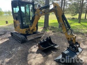 Minigrävare med redskap CAT 302